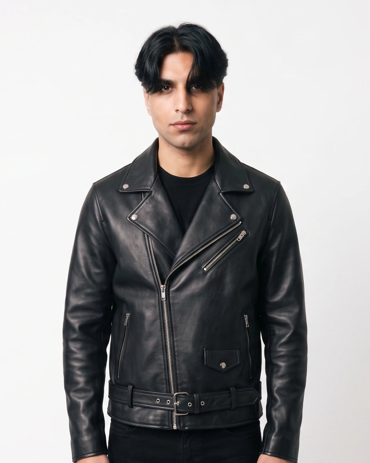 Zaryash black faux leather biker jacket, front view with asymmetric zip, studded lapels and belt