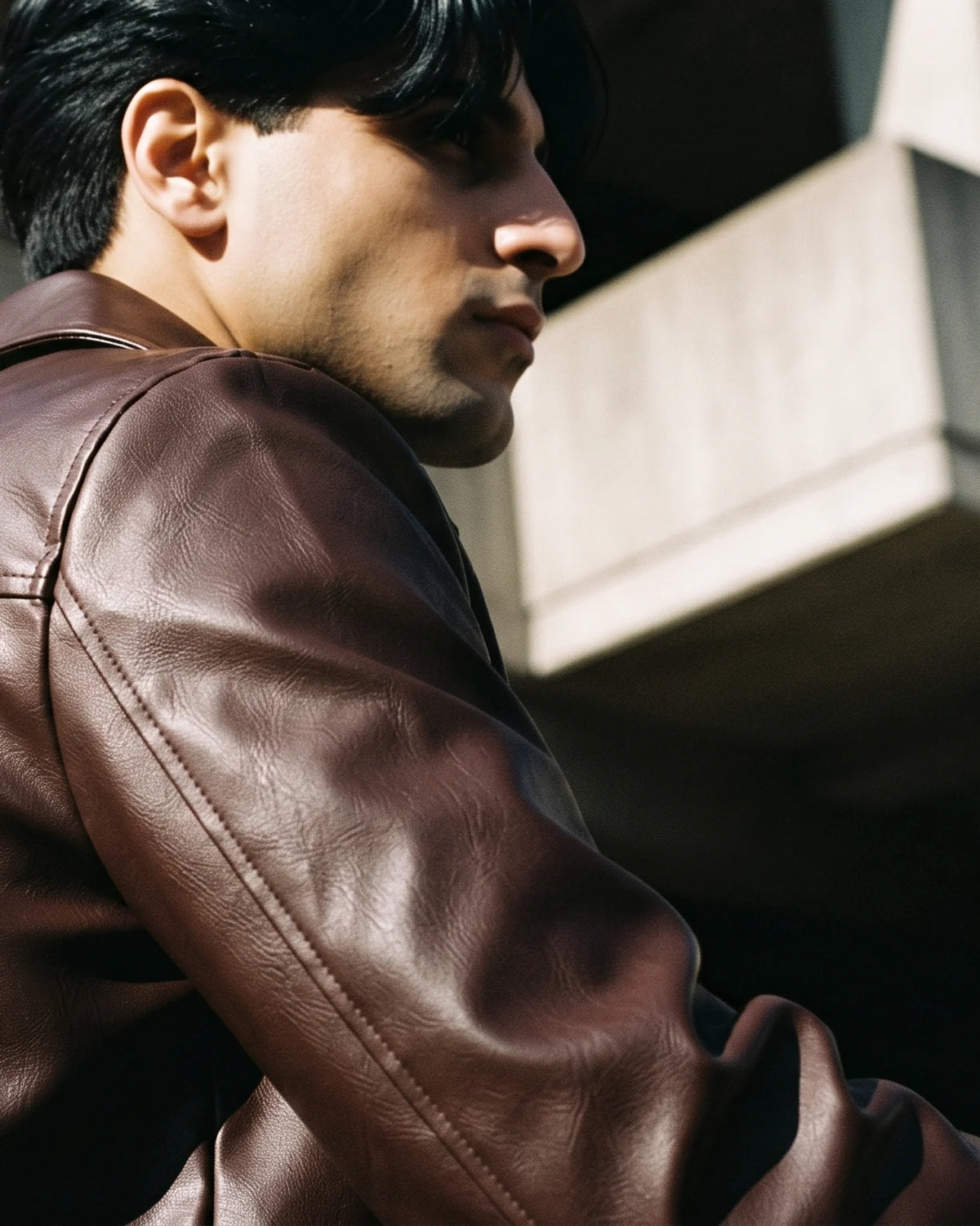 Zaryash dark brown faux leather Korean jacket, three-quarter view